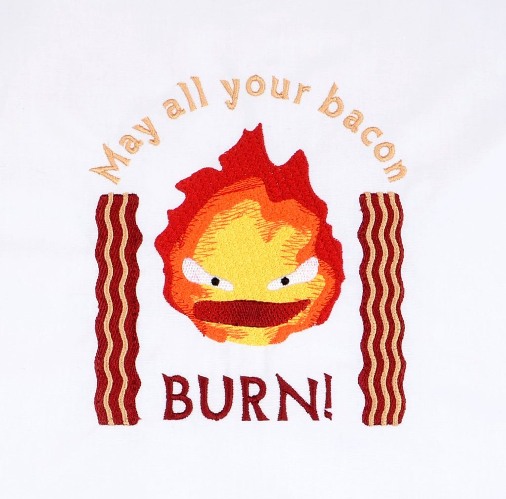 Angry Flame May all Your Bacon Burn – String Theory Fabric Art