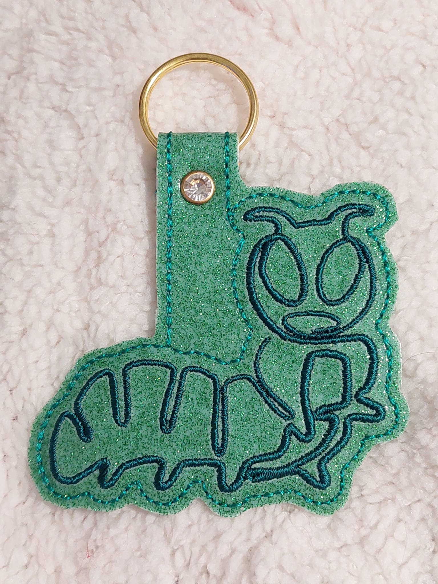 Continuous Line Caterpillar Fob ITH machine embroidery design