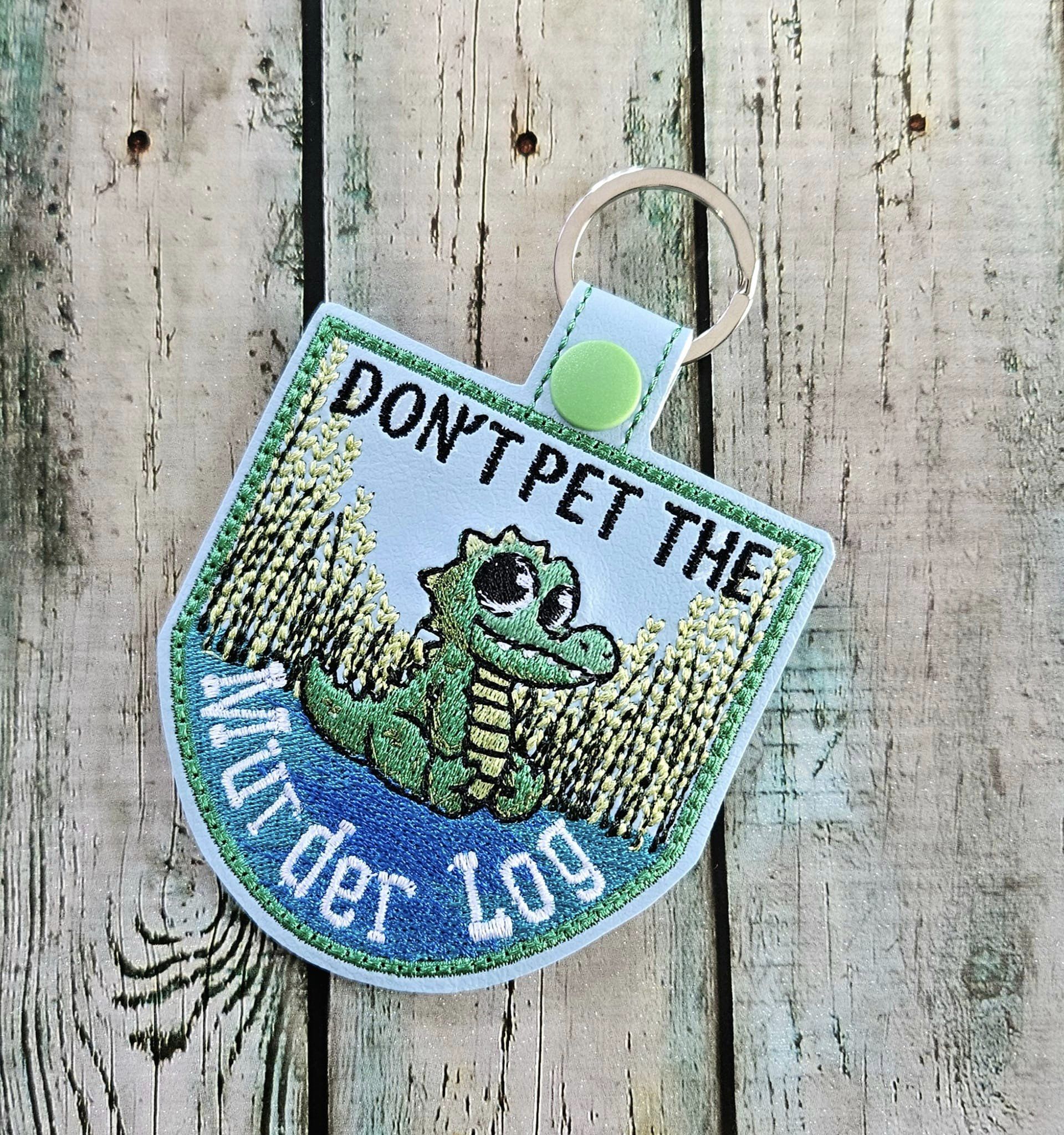Dont Pet the Murder Log fob ITH Machine Embroidery Design