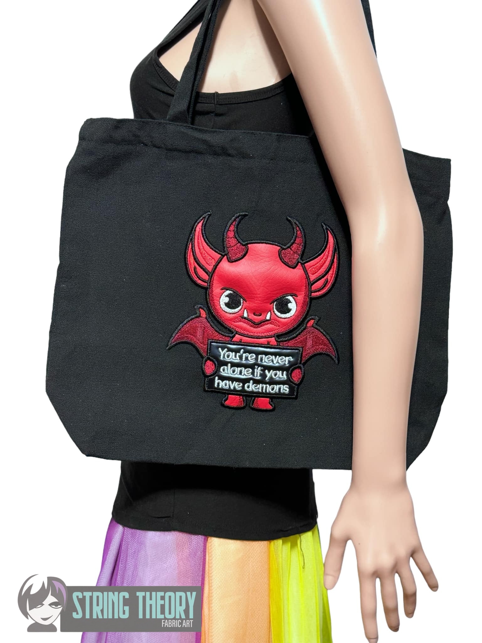 You're never alone if you have demons machine embroidery design