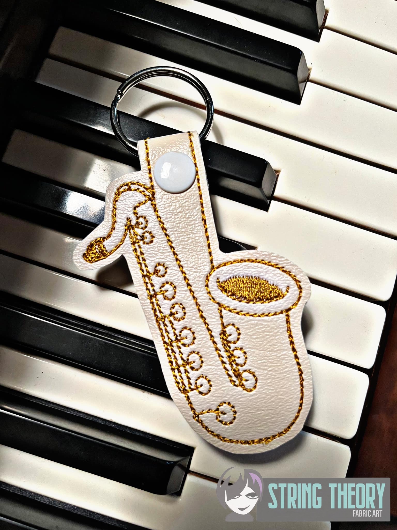 Saxophone ITH fob machine embroidery design