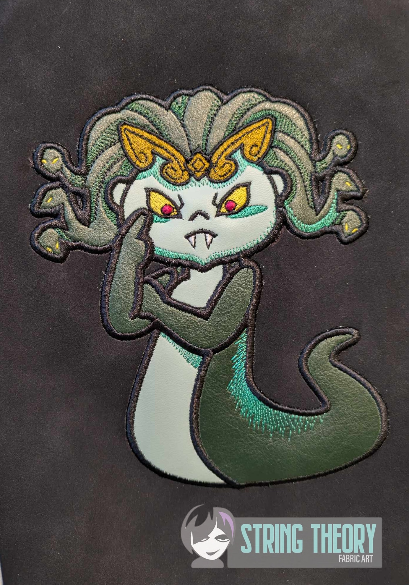 Slinky the Gorgon machine embroidery pattern