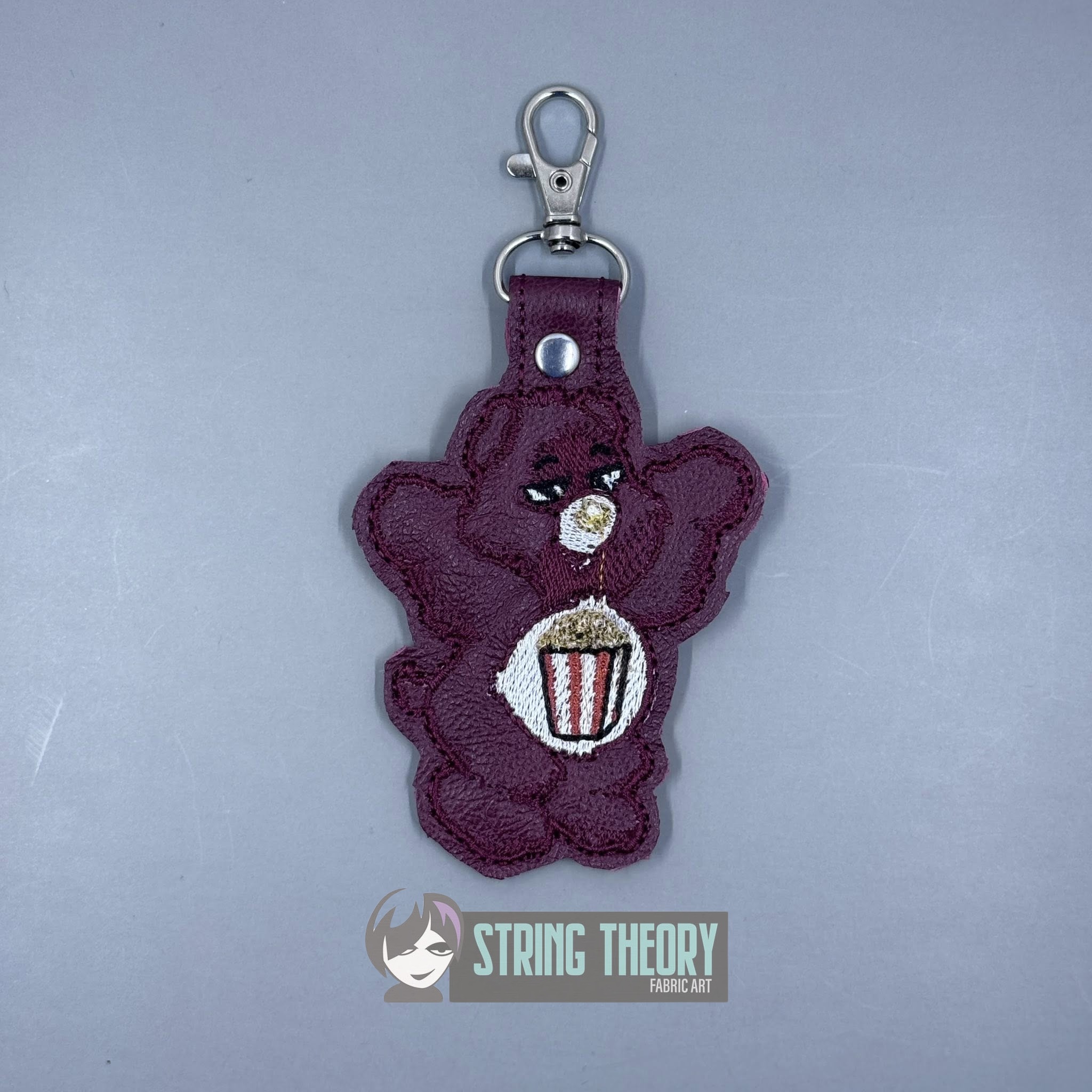 Drama Bear - Don't Care Bear ITH snap tab key fob machine embroidery design