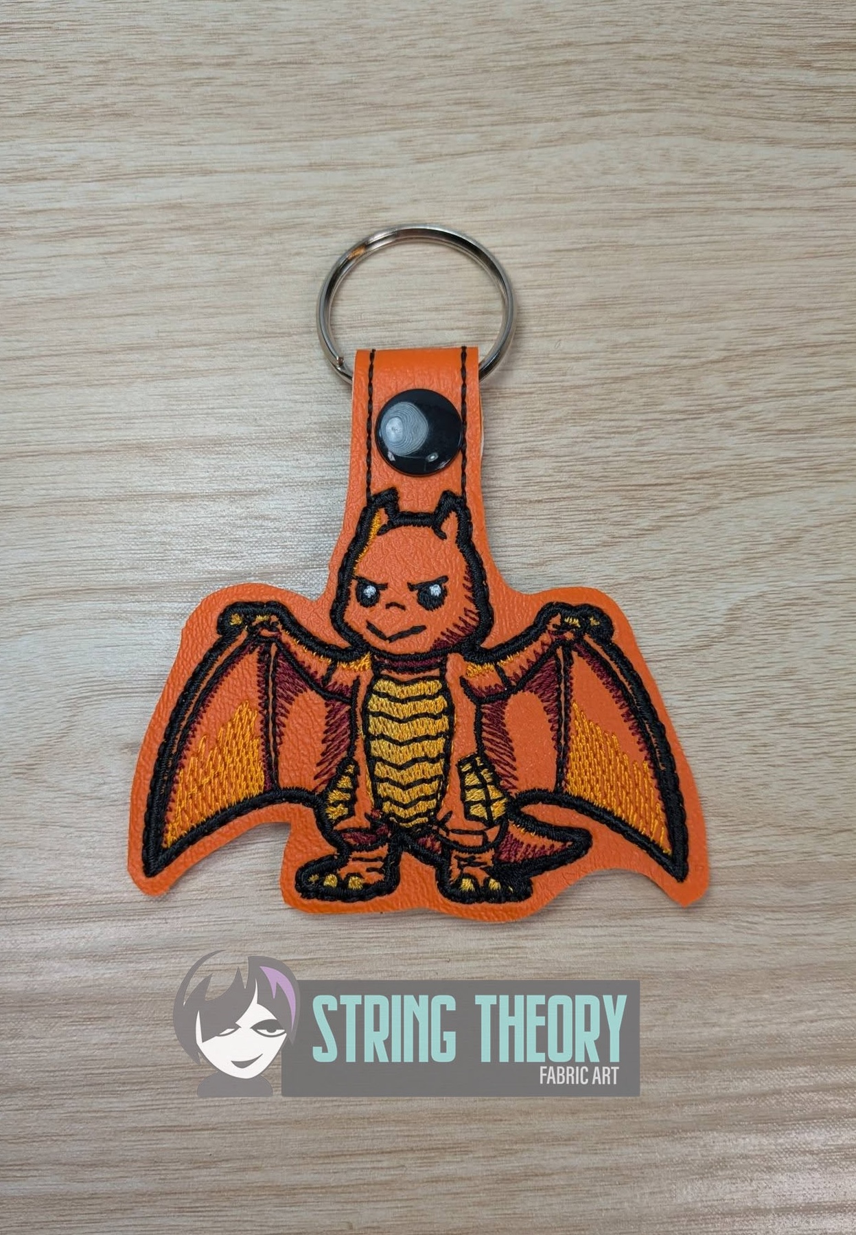 Chibi Kaiju Rodan TH snap tab key fob machine embroidery design