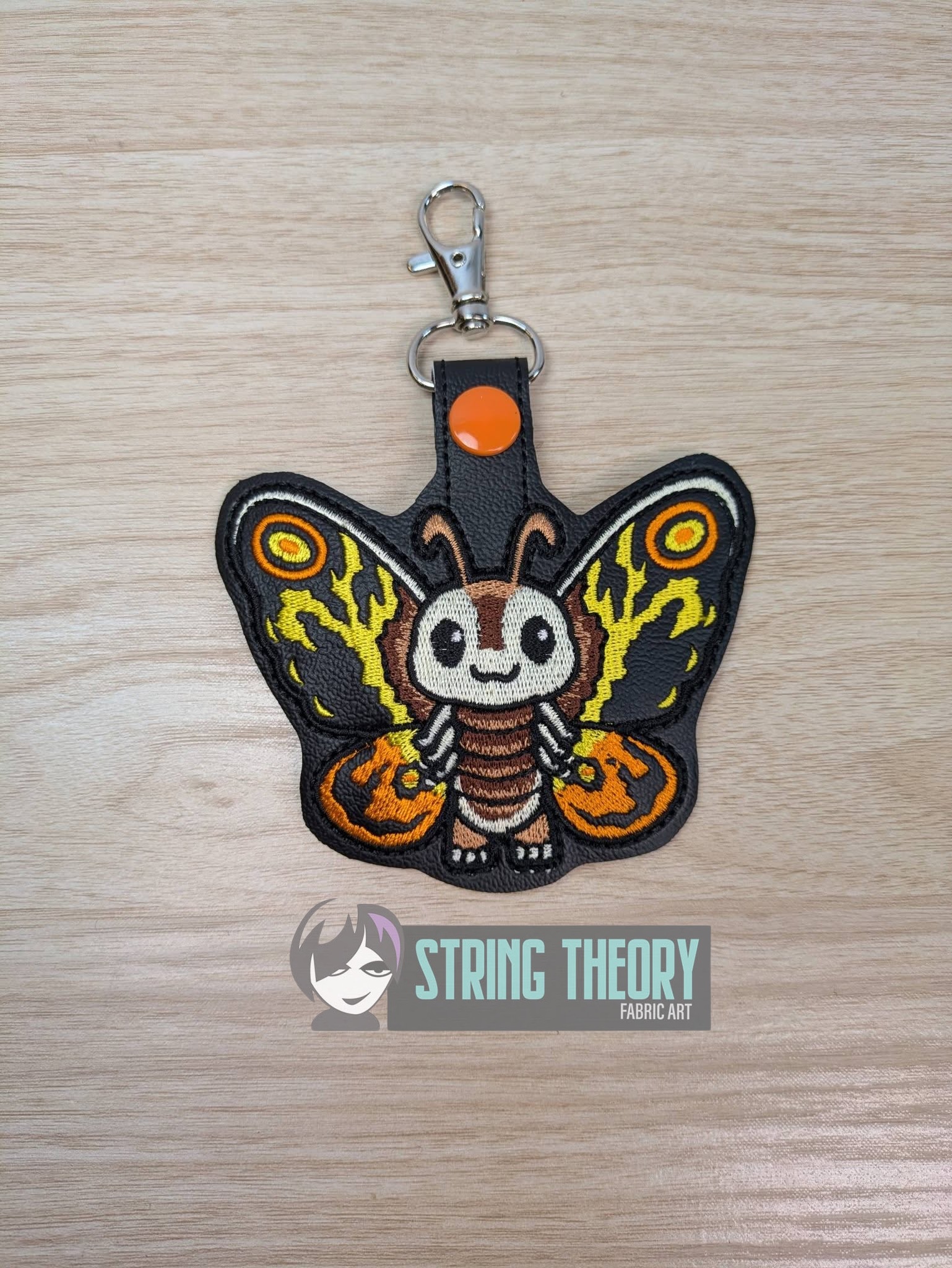 Chibi Kaiju Mothra TH snap tab key fob machine embroidery design