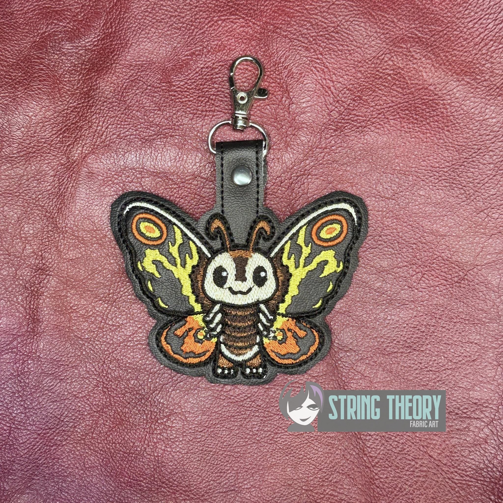 Chibi Kaiju Mothra TH snap tab key fob machine embroidery design