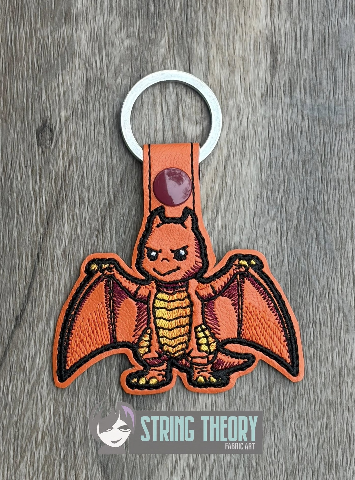 Chibi Kaiju Rodan TH snap tab key fob machine embroidery design