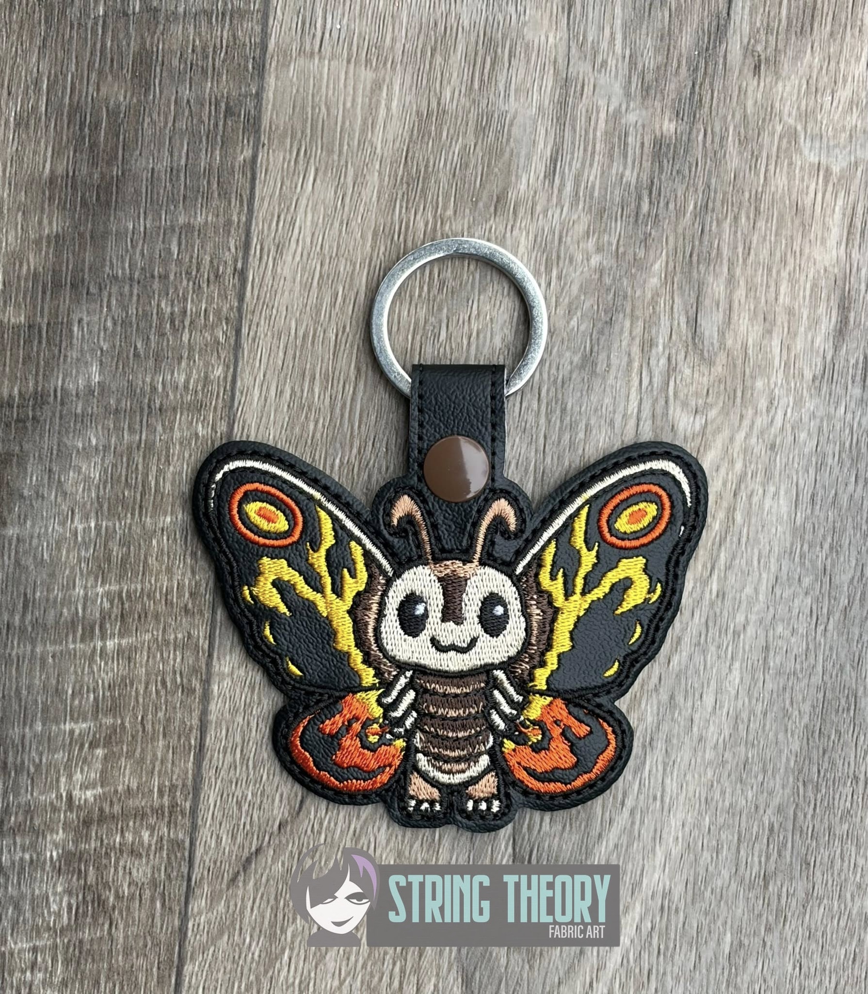 Chibi Kaiju Mothra TH snap tab key fob machine embroidery design