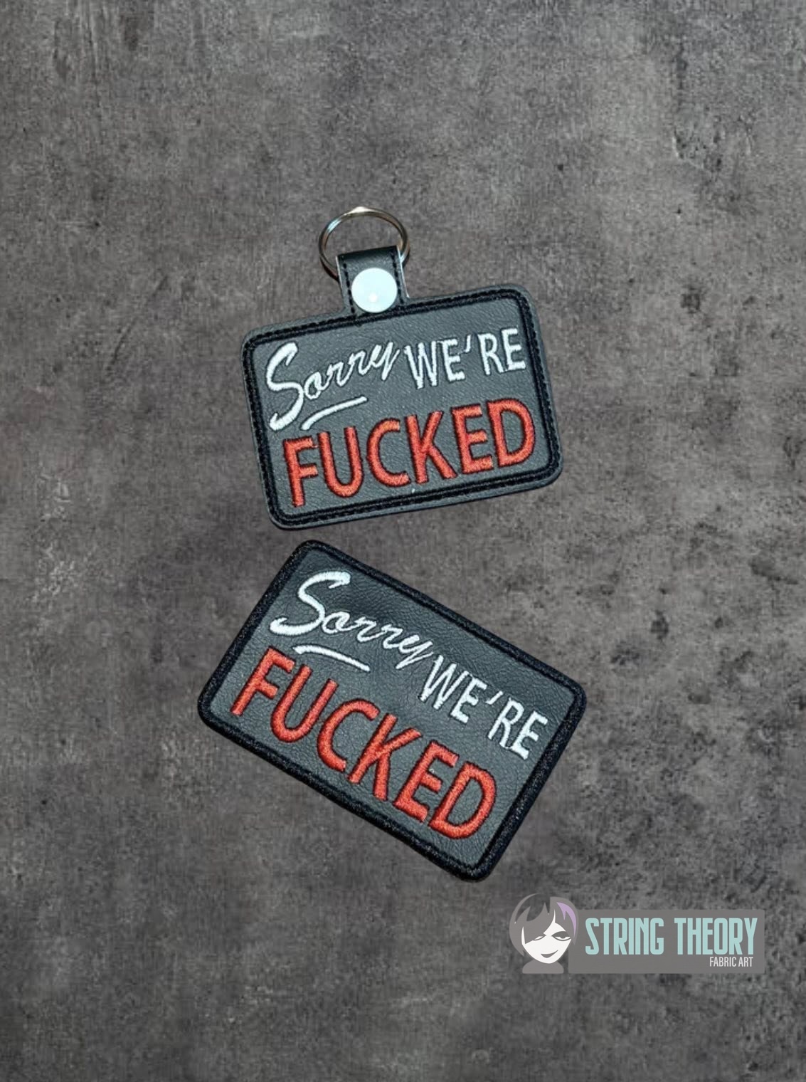 Sorry! We’re Fucked fob patch ITH machine embroidery design