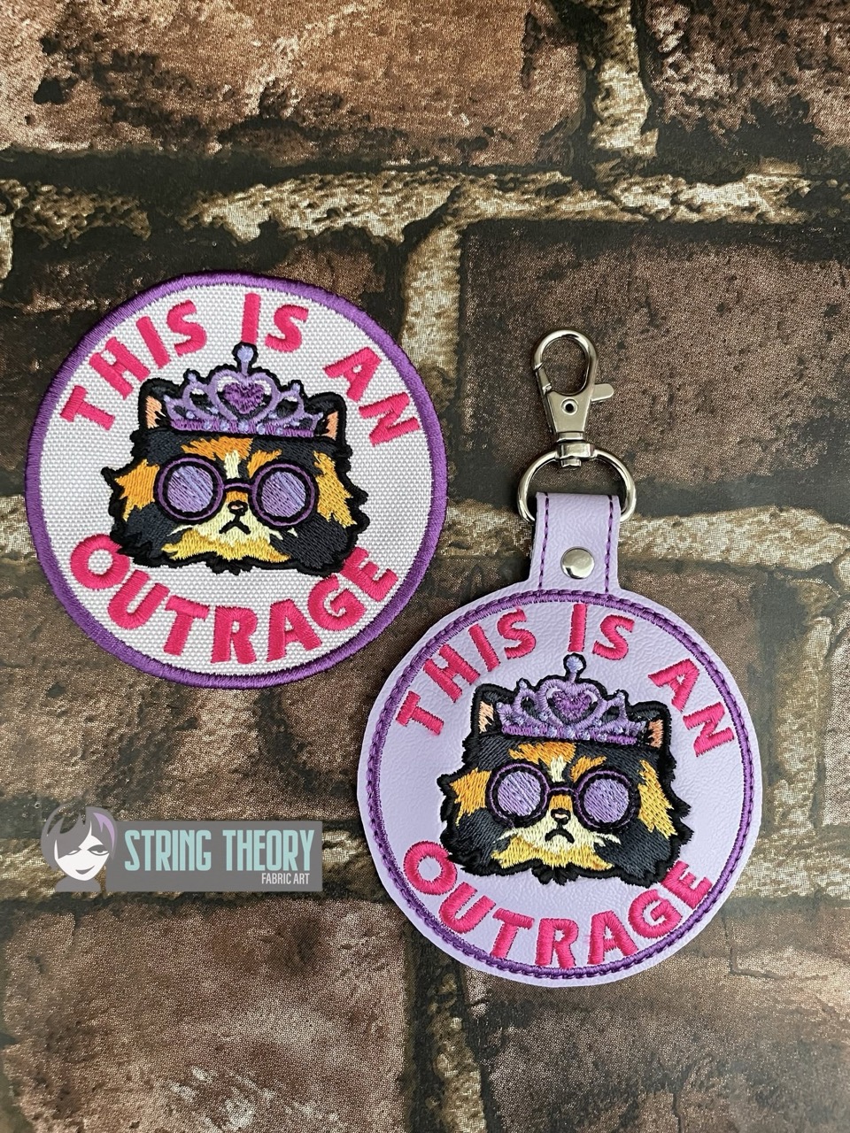 DCC This is an outrage fob patch ITH machine embroidery design