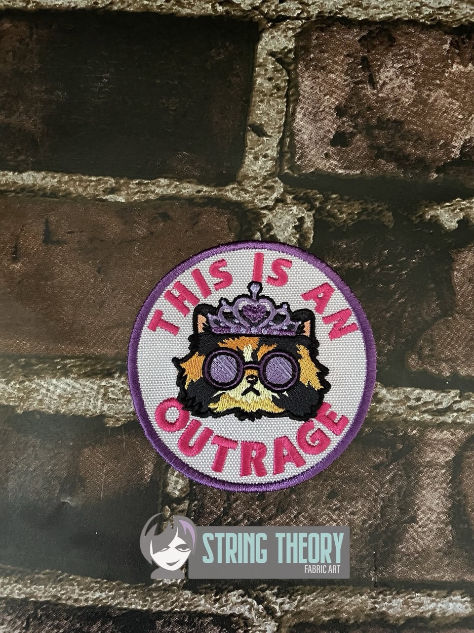 DCC This is an outrage fob patch ITH machine embroidery design