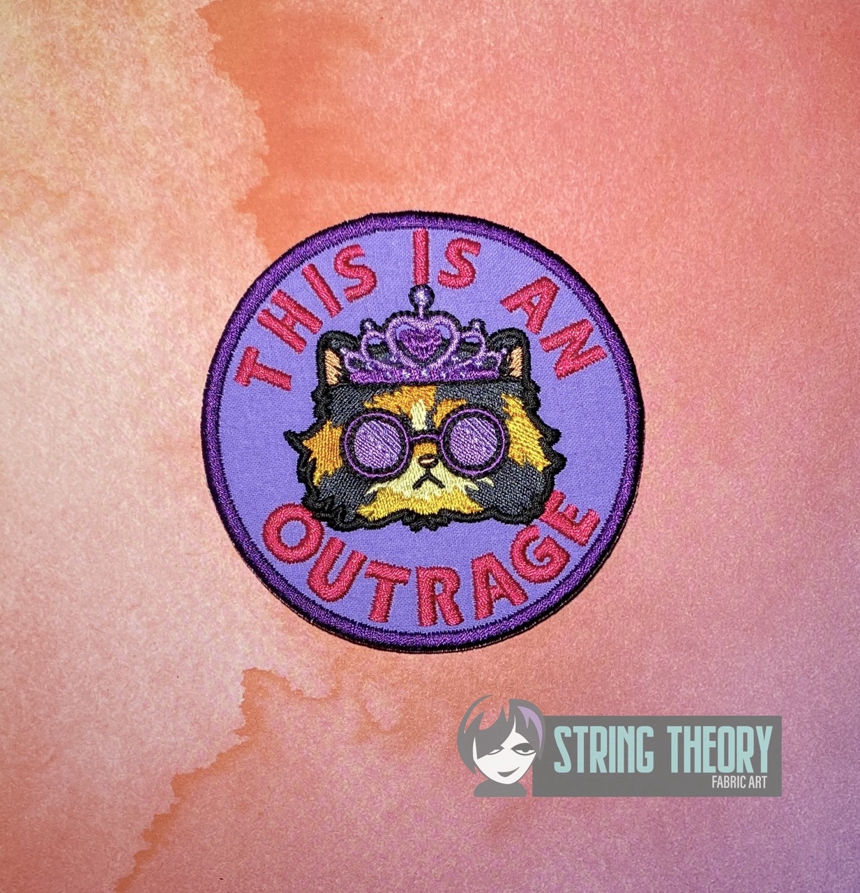 DCC This is an outrage fob patch ITH machine embroidery design