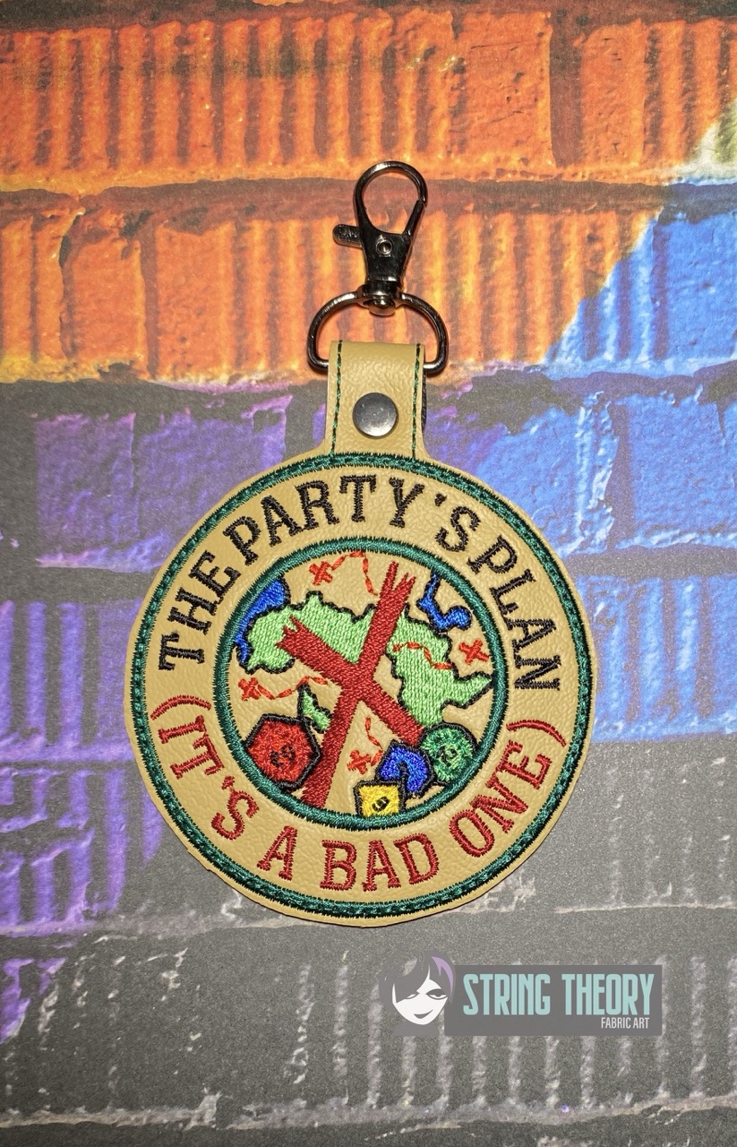DND The Party's Plan ITH fob machine embroidery design