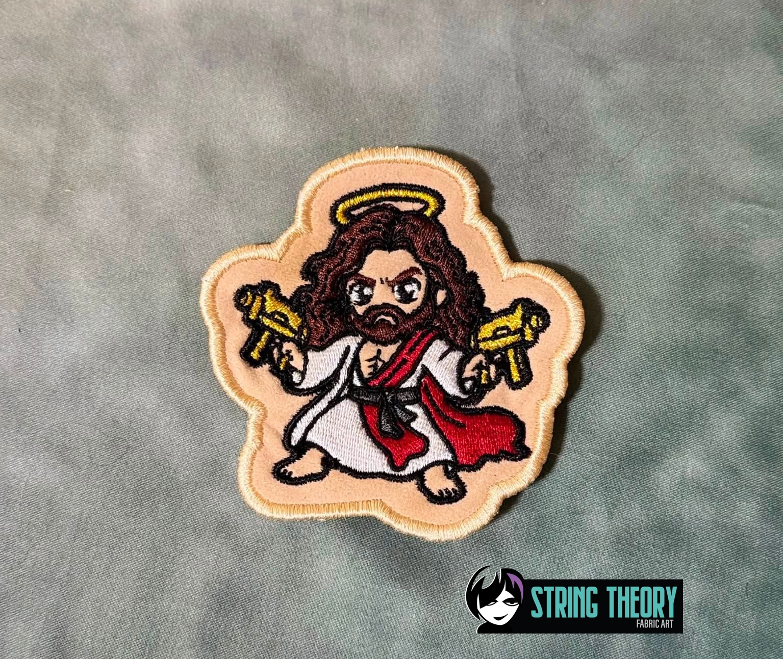 DCC Chibi Uzi Jesus fob patch ITH machine embroidery design