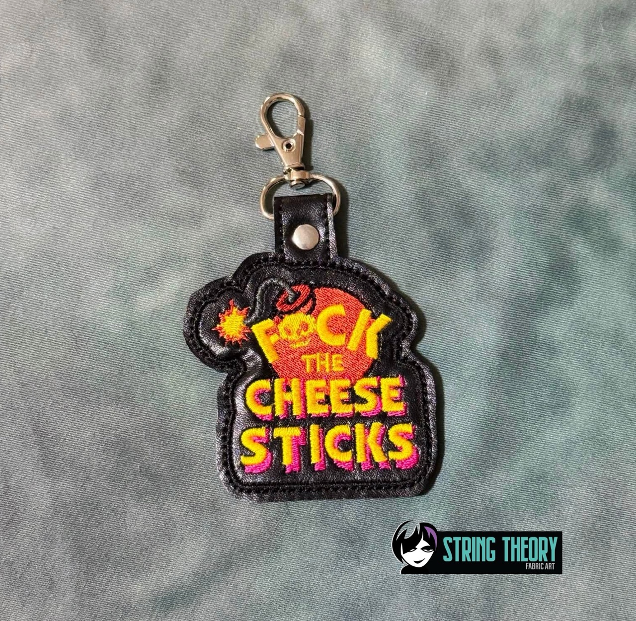 DCC – Fuck the Cheese Sticks fob patch ITH machine embroidery design