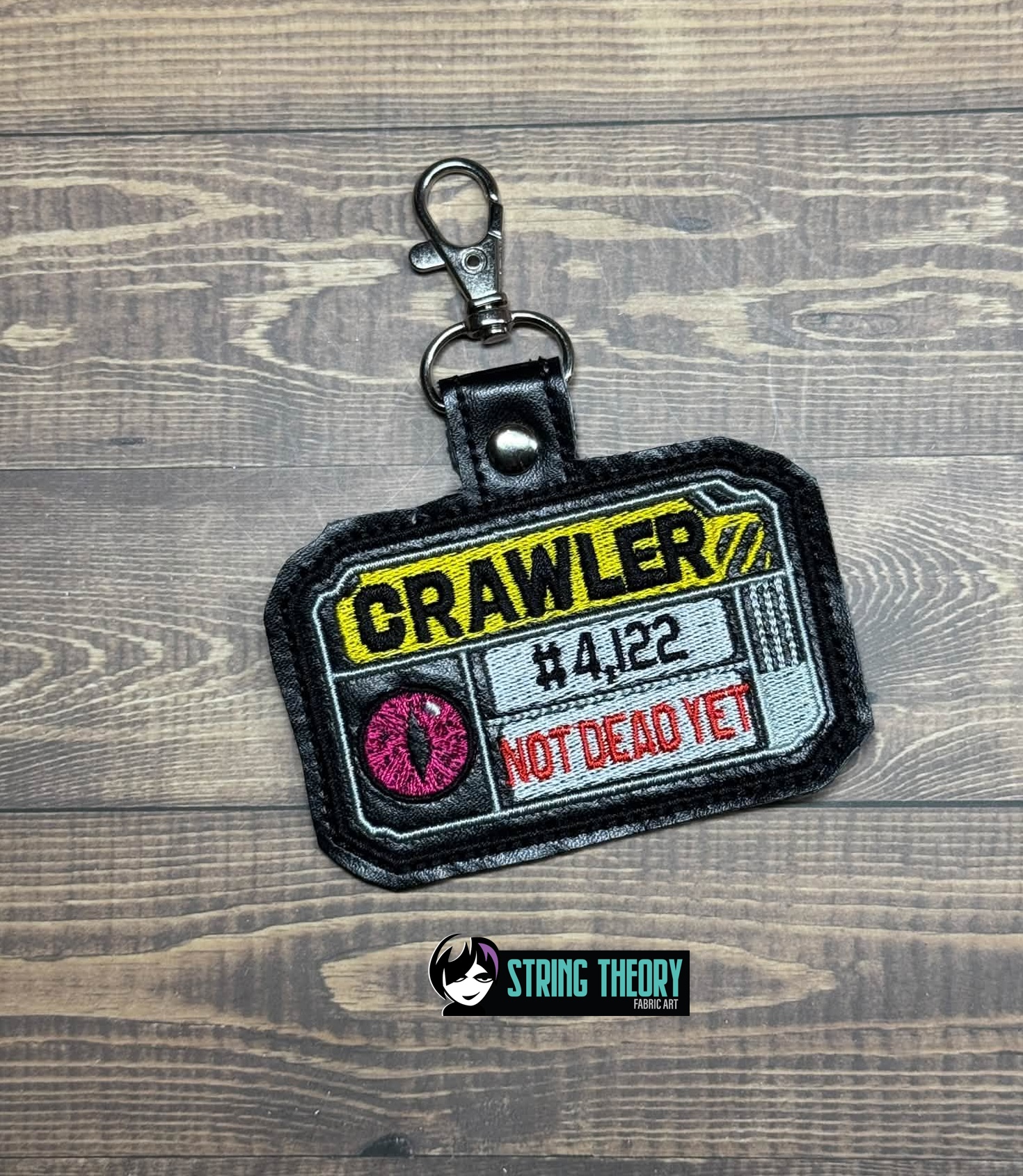 DCC – Crawler ID fob patch ITH machine embroidery design