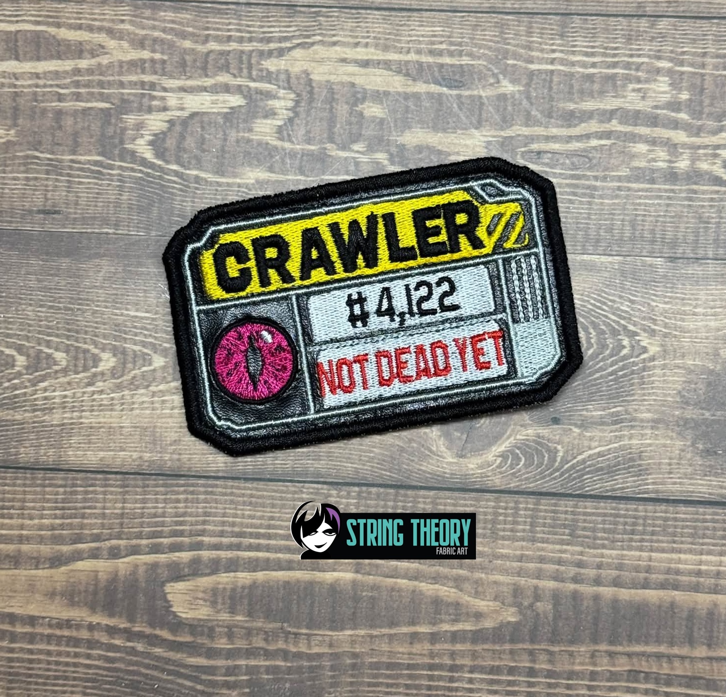 DCC – Crawler ID fob patch ITH machine embroidery design