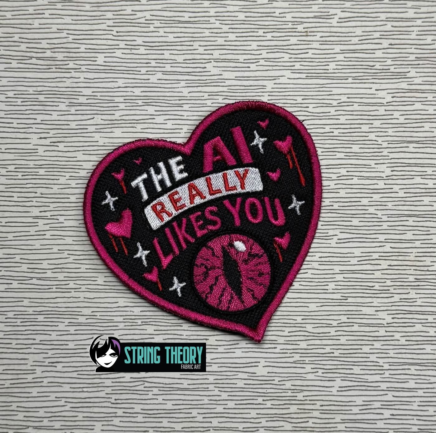 DCC – The AI Likes You fob patch ITH machine embroidery design